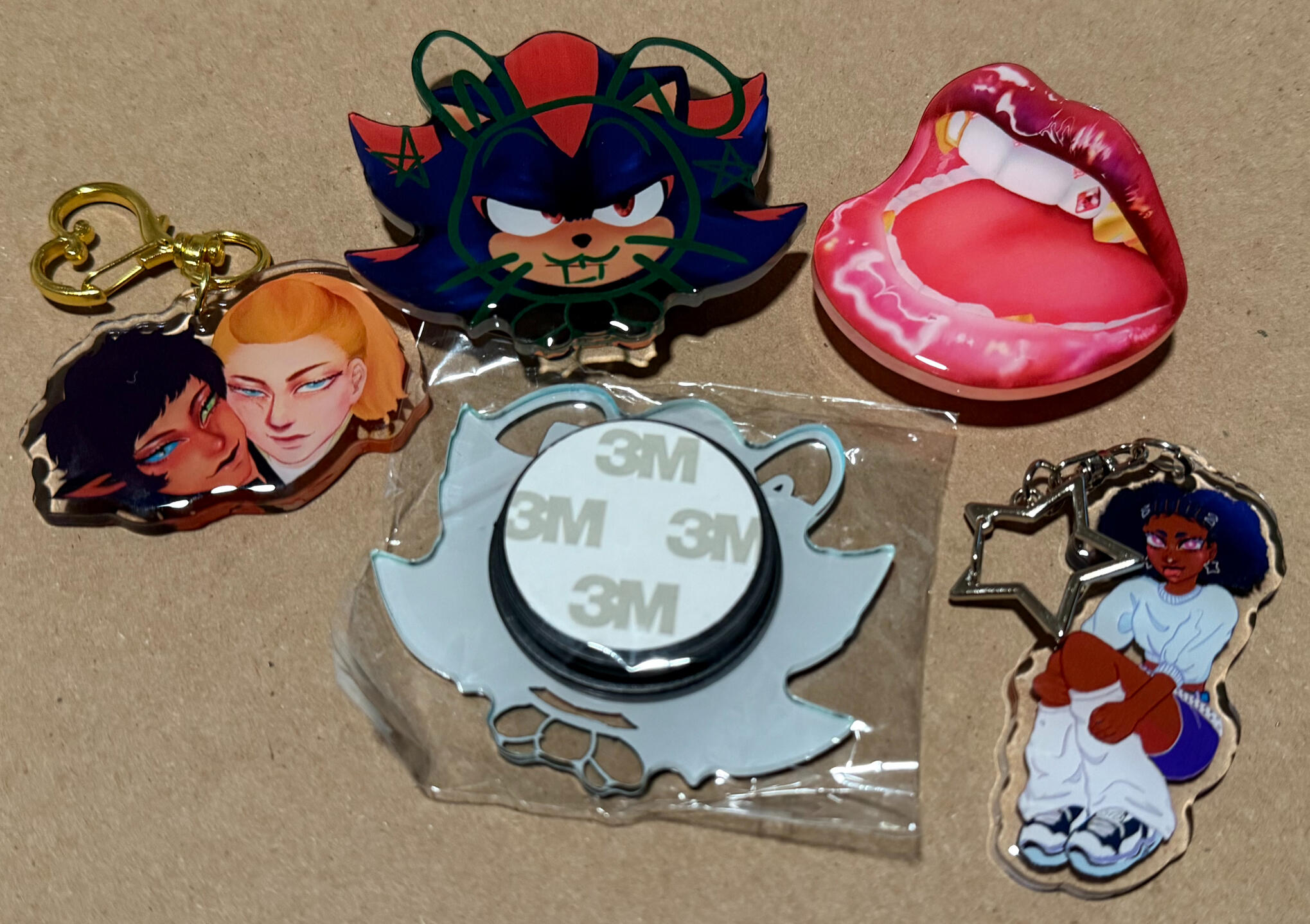 Phone Grips and Acrylic keychains